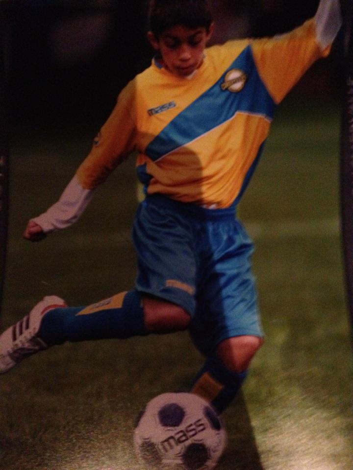 Kicking a ball as a kid