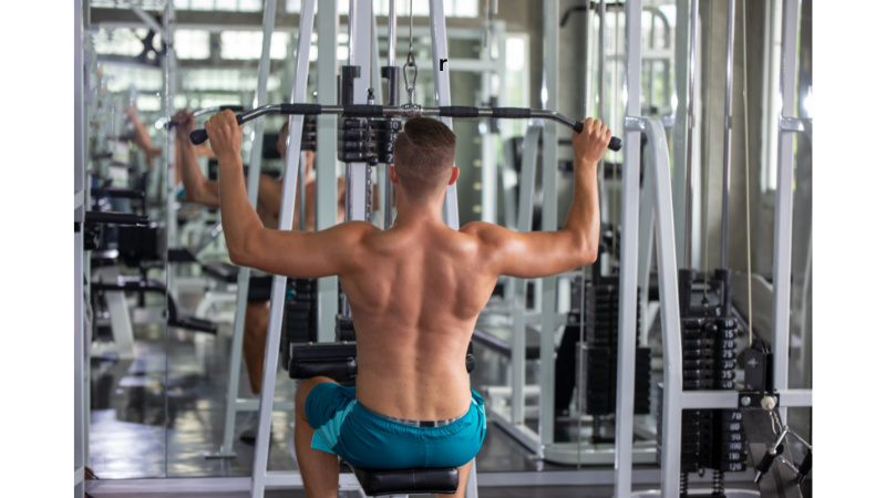 man doing lateral pulldown