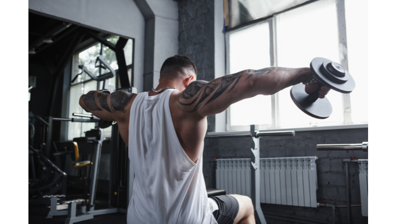 man doing lateral raises