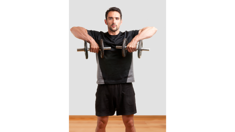 man doing upright dumbbell raise

